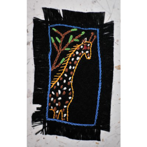 Handcrafted giraffe textile artwork featuring colourful embroidery on black fabric, available at Teatrick Lavender Estate gift shop.