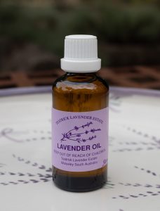 Pure lavender essential oil from Teatrick Lavender Estate presented in an amber glass bottle